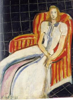 Henri Emile Benoit Matisse : simone in a striped armchair